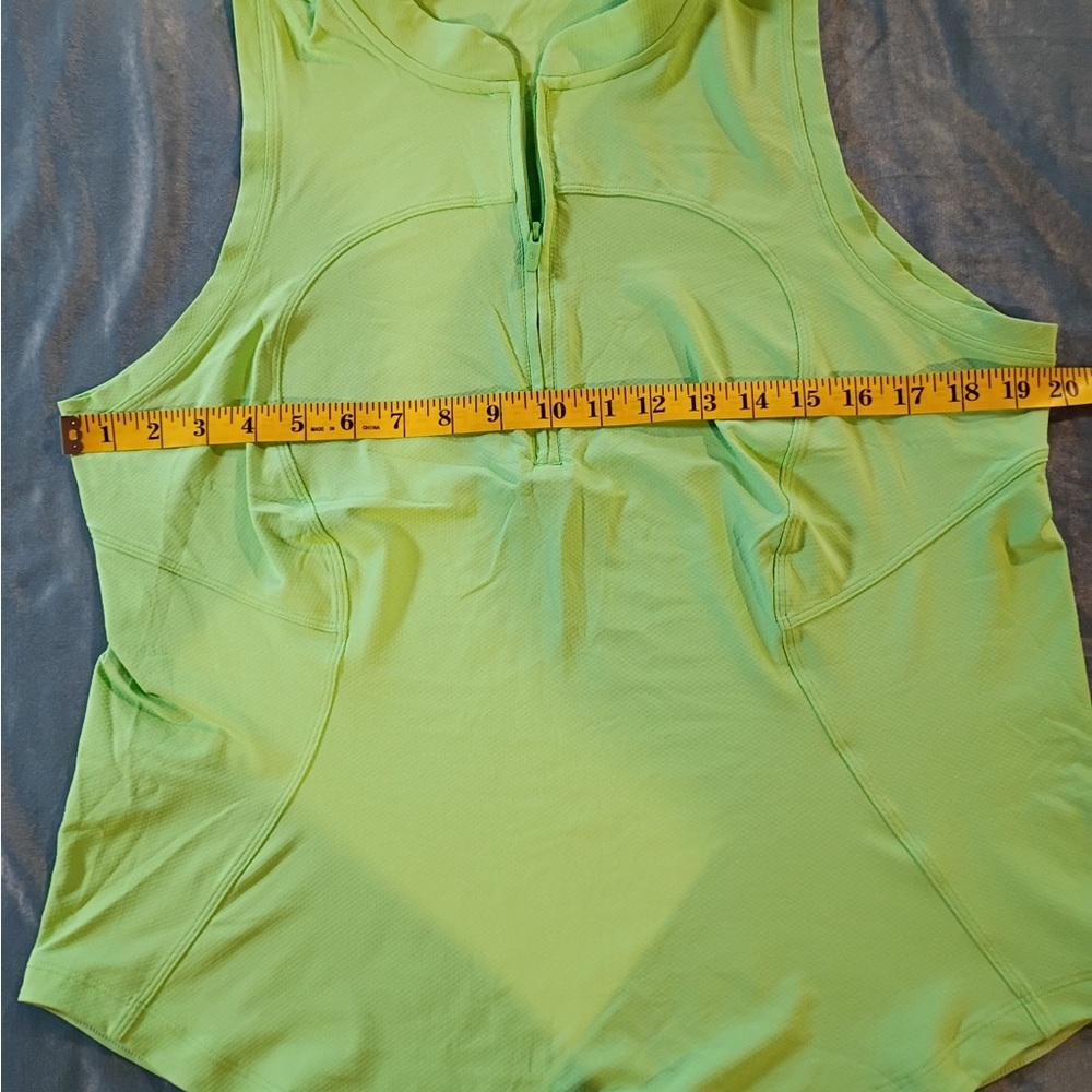 Bright neon green Lululemon sleeveless athletic top with half zip front. - Picture 3 of 7